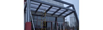 Накрытие монолитным поликарбонатом навеса для входной группы, компания Автэк